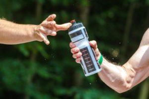 Handing a Sports Water Bottle