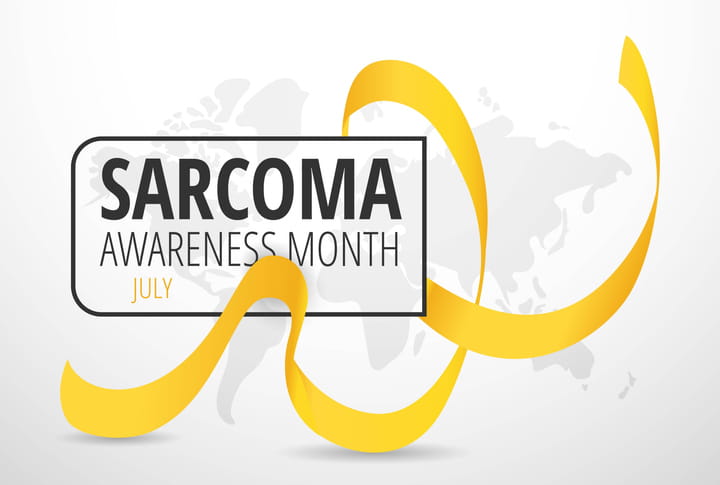 A Yellow Ribbon With The Text: Sarcoma Awareness Month - July.