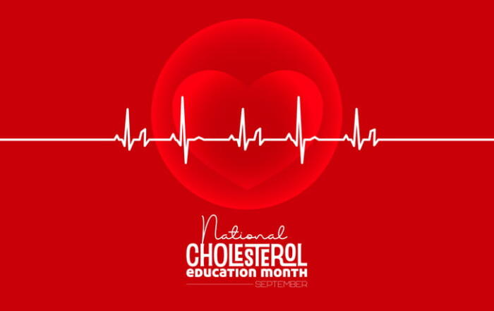 A Graphic For National Cholesterol Education Month In September, Featuring A White Ekg Heartbeat Line Passing Over A Large Heart Icon On A Red Background.