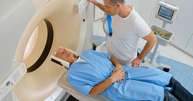 Pdc Home 2 A Man About To Enter A Ct Scan For Cancer Screening.