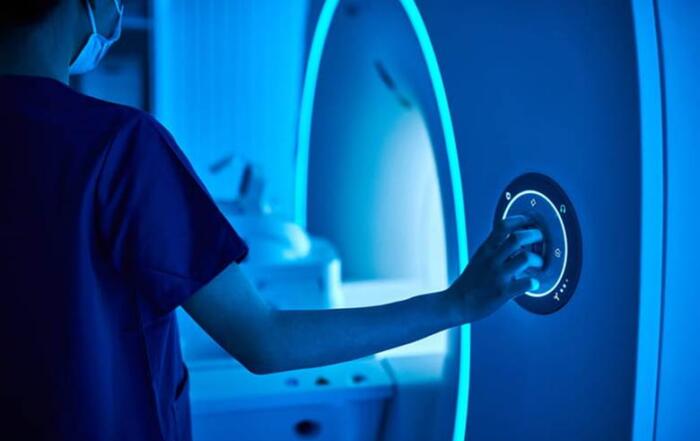 Pdc Home 2 A Nurse Operating A Ct Scanner.